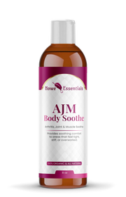 AJM Body Soothe natural botanical 8 oz squeeze bottle displayed in a clean, premium wellness setting with warm lighting and modern packaging