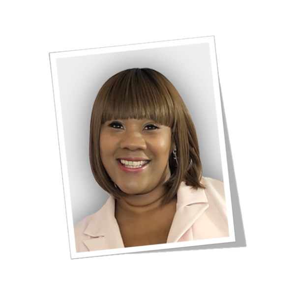 Howe Essentials founder, Tanya Howe,smiling with shoulder-length brown hair and straight bangs, wearing a light pink blazer, shown inside a tilted white-bordered photo frame on a white background.